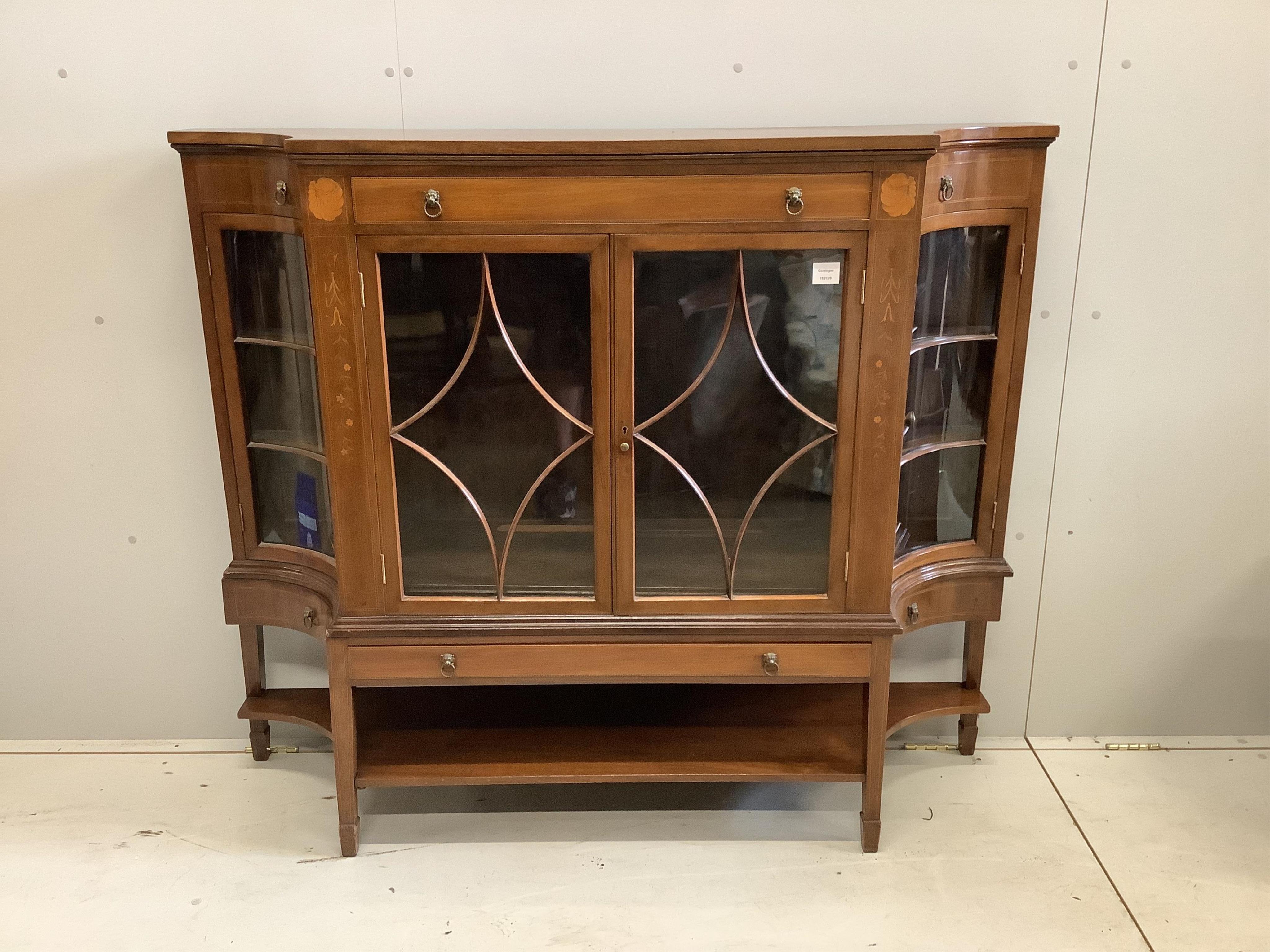 An Edwardian inlaid mahogany display cabinet, width 145cm, depth 36cm, height 123cm. Condition - fair